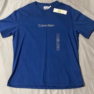 BRAND NEW Calvin Klein blue t shirt. Medium size, relax fit.